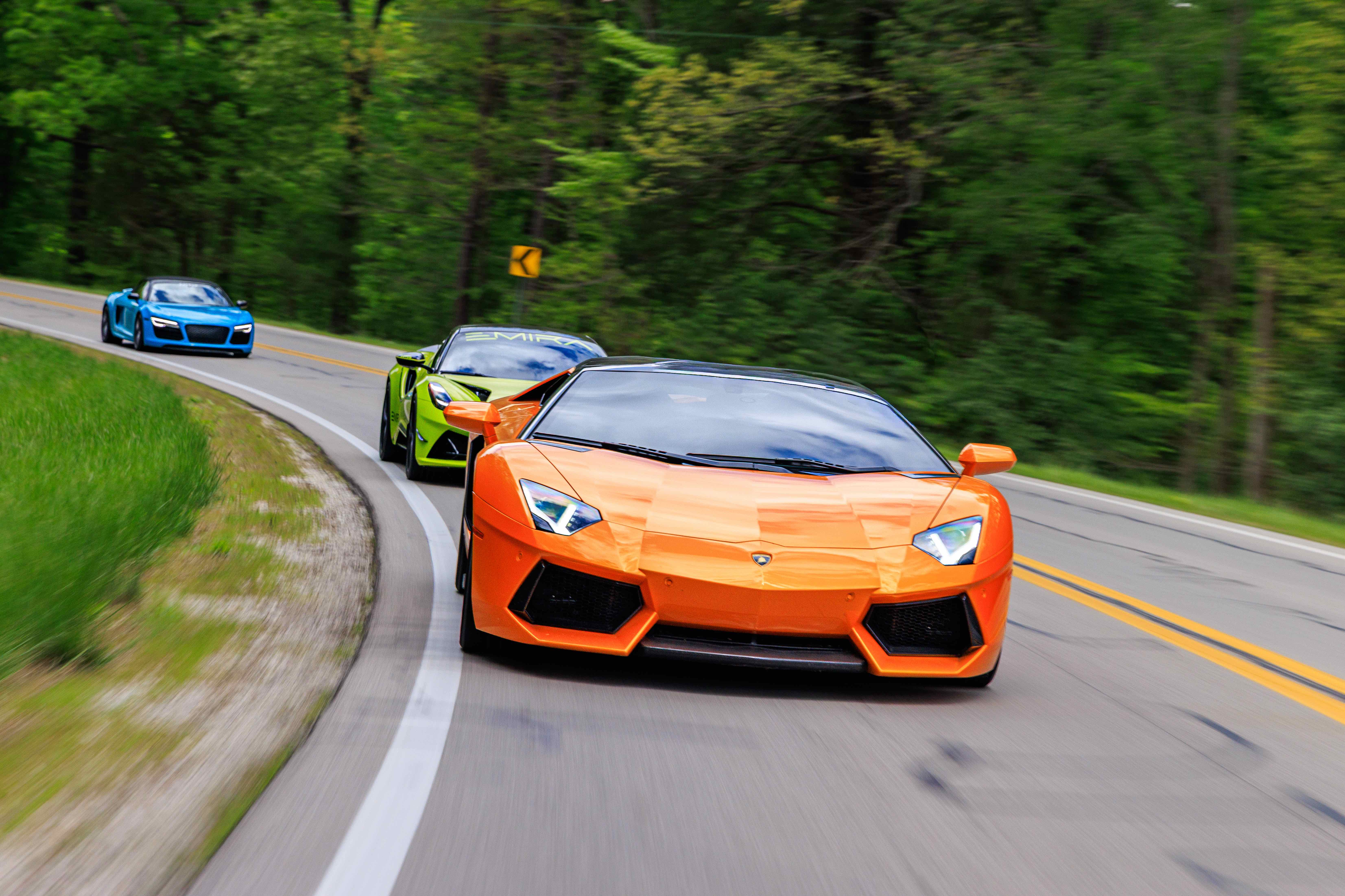 Supercars on a canyon road, photographed by Nahundi Studios